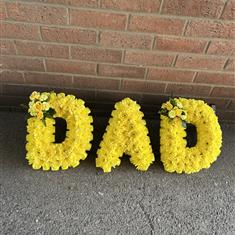 Dad frame massed in yellow flowers